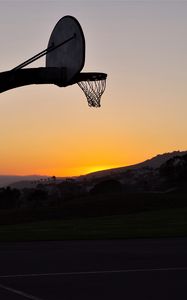 Preview wallpaper basketball hoop, mesh, basketball, sport, sunset, dark