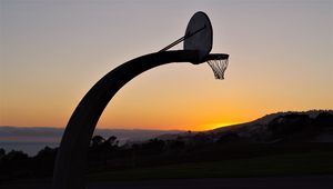 Preview wallpaper basketball hoop, mesh, basketball, sport, sunset, dark