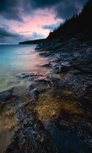 Preview wallpaper bay, coast, sunset, stones, trees, clouds, sky, georgia