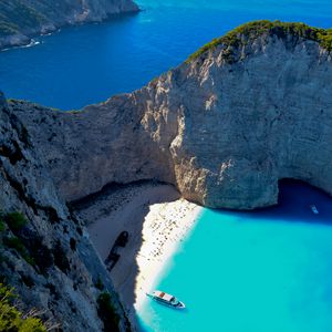 Preview wallpaper bay, rocks, coast, sea, boat, landscape, aerial view