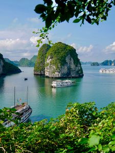 Preview wallpaper bay, rocks, ocean, ship, vegetation, vietnam