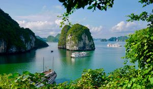 Preview wallpaper bay, rocks, ocean, ship, vegetation, vietnam