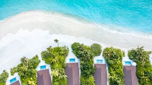 Preview wallpaper beach, buildings, aerial view, sea, palm trees