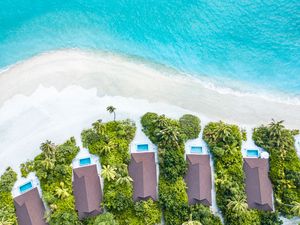 Preview wallpaper beach, buildings, aerial view, sea, palm trees