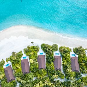 Preview wallpaper beach, buildings, aerial view, sea, palm trees