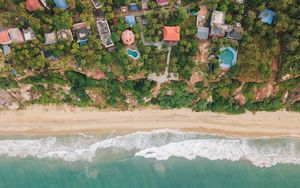 Preview wallpaper beach, coast, aerial view, buildings, palm trees
