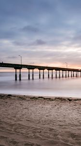 Preview wallpaper beach, coast, sea, bridge, twilight