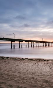 Preview wallpaper beach, coast, sea, bridge, twilight