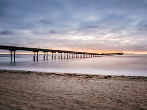 Preview wallpaper beach, coast, sea, bridge, twilight