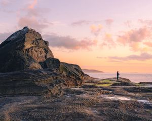 Preview wallpaper beach, coast, silhouette, rock, sea