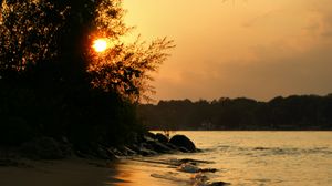 Preview wallpaper beach, coast, sunset, sea, glare