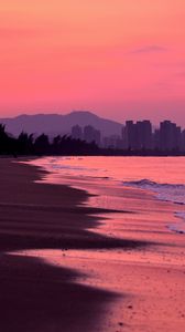 Preview wallpaper beach, dusk, sea, coast, city