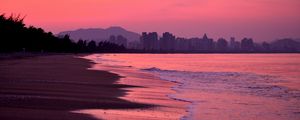 Preview wallpaper beach, dusk, sea, coast, city