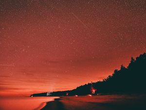 Preview wallpaper beach, dusk, starry sky, dark, red