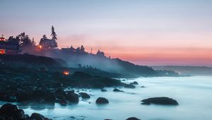 Preview wallpaper beach, fog, coast, sunset, camping, landscape, stones