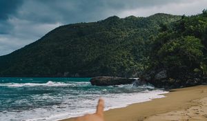 Preview wallpaper beach, hand, rocks, sea, waves
