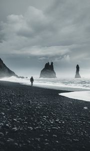 Preview wallpaper beach, man, sea, waves, rocks