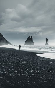 Preview wallpaper beach, man, sea, waves, rocks