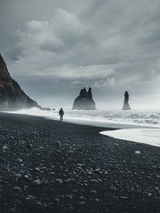 Preview wallpaper beach, man, sea, waves, rocks