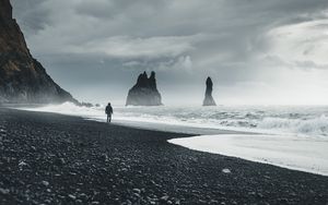 Preview wallpaper beach, man, sea, waves, rocks