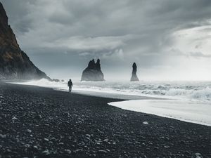 Preview wallpaper beach, man, sea, waves, rocks