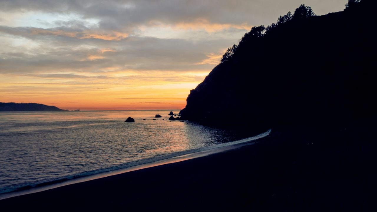 Wallpaper beach, mountains, sea, sunset, silhouettes, dark