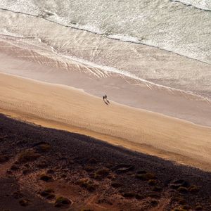 Preview wallpaper beach, people, aerial view, silhouettes, coast