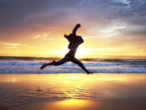 Preview wallpaper beach, people, jump, sunset, sea