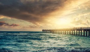 Preview wallpaper beach, pier, waves, sunset