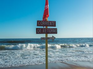 Preview wallpaper beach, pointer, sign, flag