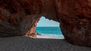 Preview wallpaper beach, rock, cave, sea, sand, water