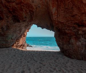 Preview wallpaper beach, rock, cave, sea, sand, water