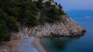Preview wallpaper beach, rock, shore, dusk, landscape