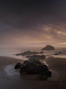 Preview wallpaper beach, rocks, sea, landscape, twilight