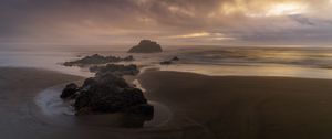 Preview wallpaper beach, rocks, sea, landscape, twilight