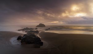 Preview wallpaper beach, rocks, sea, landscape, twilight