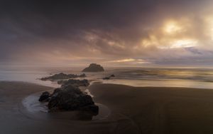 Preview wallpaper beach, rocks, sea, landscape, twilight