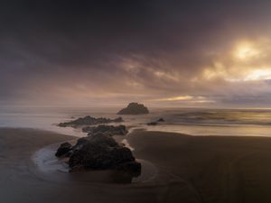 Preview wallpaper beach, rocks, sea, landscape, twilight
