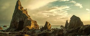 Preview wallpaper beach, rocks, stones, coast, sky