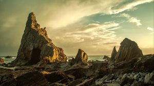 Preview wallpaper beach, rocks, stones, coast, sky