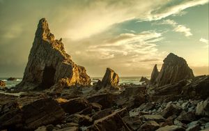 Preview wallpaper beach, rocks, stones, coast, sky