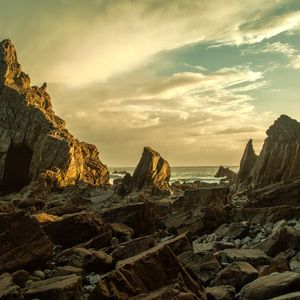 Preview wallpaper beach, rocks, stones, coast, sky