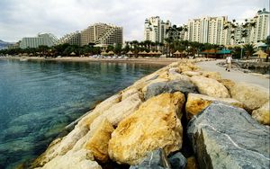 Preview wallpaper beach, rocks, water, homes, resort