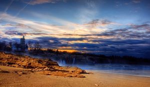 Preview wallpaper beach, sand, lighting, house, sea, sky, evening