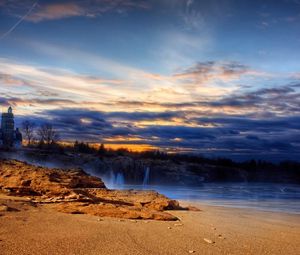 Preview wallpaper beach, sand, lighting, house, sea, sky, evening