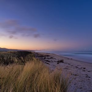 Preview wallpaper beach, sand, sea, coast, dusk