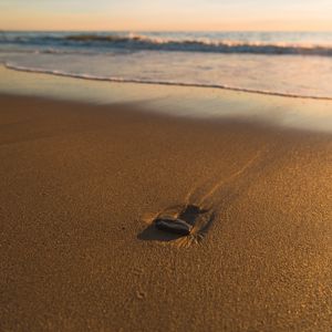 Preview wallpaper beach, sand, stone, sea, waves