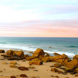 Preview wallpaper beach, sand, stones, sea, landscape