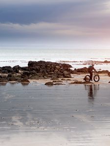 Preview wallpaper beach, sand, stones, cyclist, walk