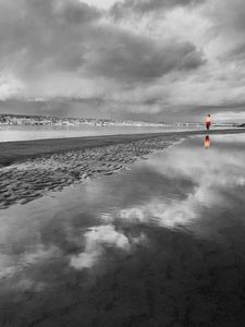 Preview wallpaper beach, sand, water, person, silhouette, black-and-white